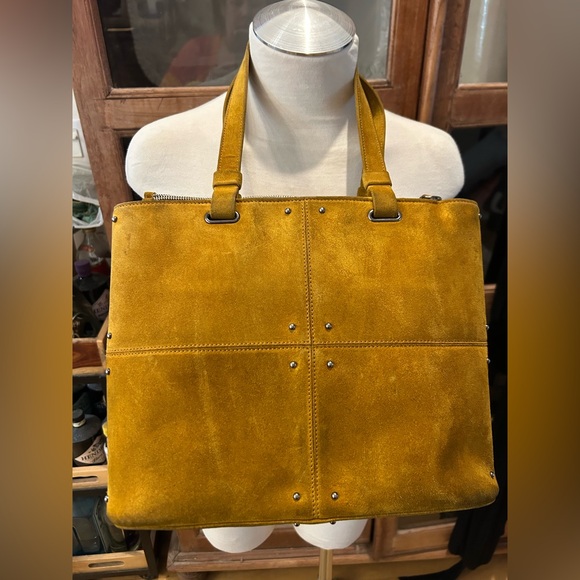 Tod's Handbags - TOD’S Quilted Classic Leather Silver-Studded Bucket Bag in Mustard